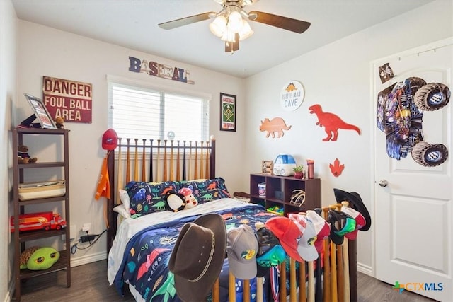 17179 Cyclone Rd, Burlington, TX 76519 - bedroom with wood finished floors and ceiling fan