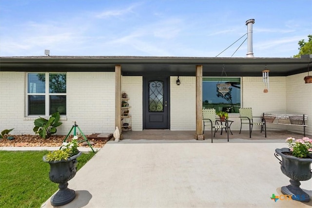 17179 Cyclone Rd, Burlington, TX 76519 - property entrance with brick siding and covered porch