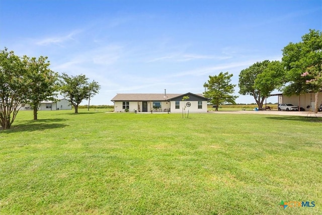 17179 Cyclone Rd, Burlington, TX 76519 - back of house featuring a yard