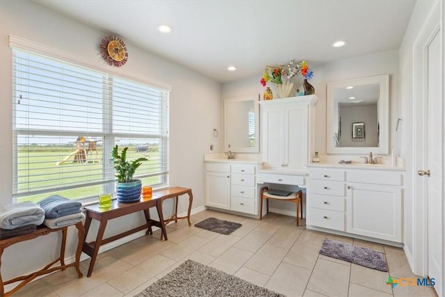 17179 Cyclone Rd, Burlington, TX 76519 - bathroom with vanity, tile patterned flooring, and recessed lighting
