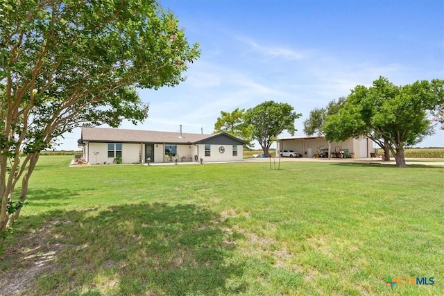 17179 Cyclone Rd, Burlington, TX 76519 - back of property featuring a lawn