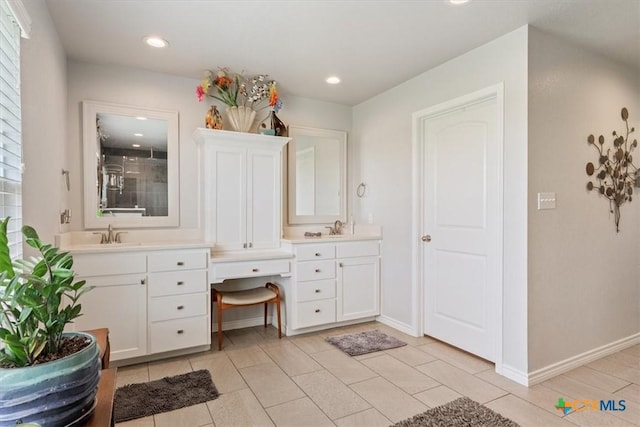 17179 Cyclone Rd, Burlington, TX 76519 - bathroom with vanity, a tile shower, recessed lighting, and tile patterned floors