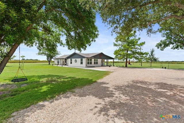 17179 Cyclone Rd, Burlington, TX 76519 - view of community featuring driveway and a lawn