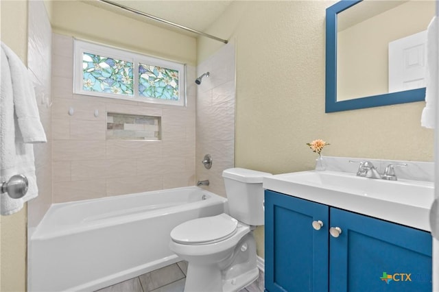 2804 Bluejay Dr, Killeen, TX 76549 - full bath featuring toilet, bathing tub / shower combination, vanity, and a textured wall