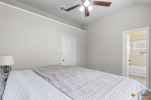 2804 Bluejay Dr, Killeen, TX 76549 - tiled bedroom with lofted ceiling, ceiling fan, and ensuite bathroom