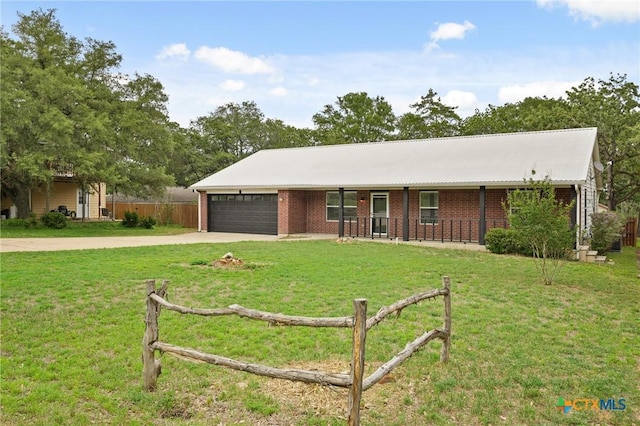 503 Pine St, Smithville, TX 78957 - single story home with an attached garage, driveway, and brick siding