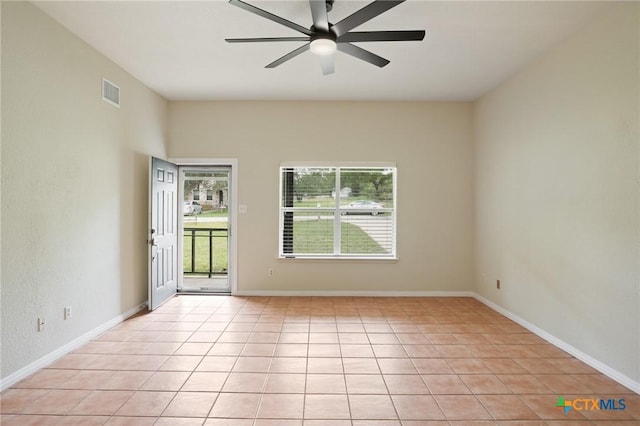 503 Pine St, Smithville, TX 78957 - spare room with a ceiling fan and light tile patterned floors