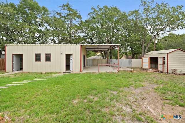 503 Pine St, Smithville, TX 78957 - view of pole building with a carport