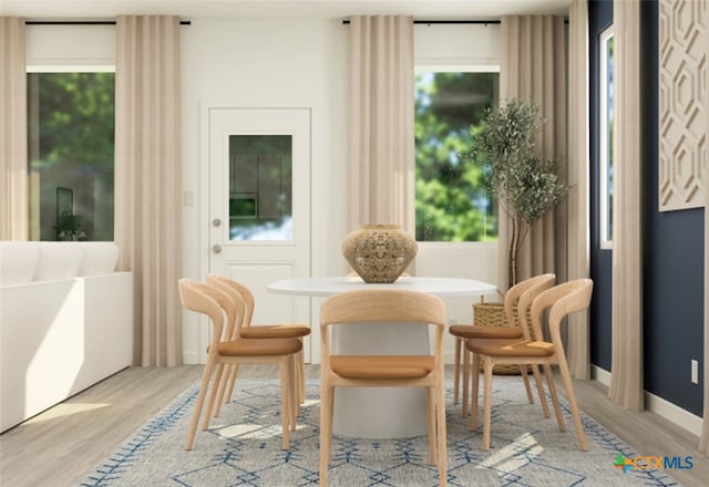 sitting room with light hardwood / wood-style floors