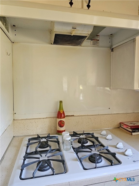 kitchen featuring white gas range