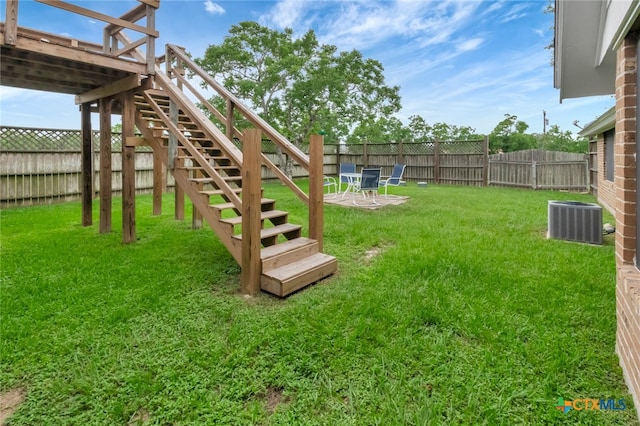 view of yard featuring central AC