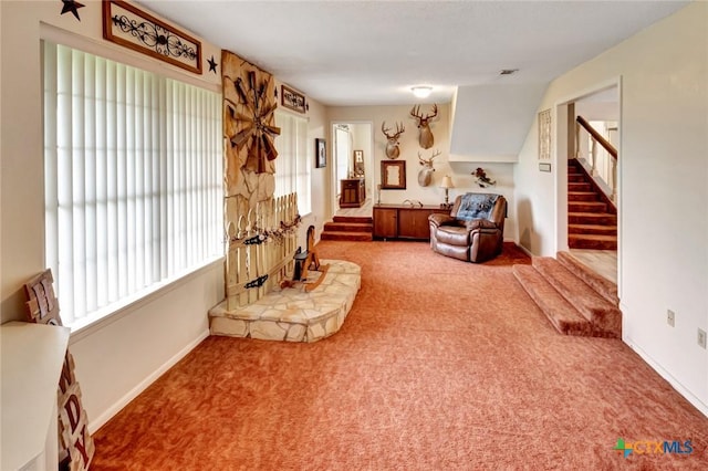 3662 N Fm 444, Inez, TX 77968 - living area featuring carpet flooring, stairway, and baseboards