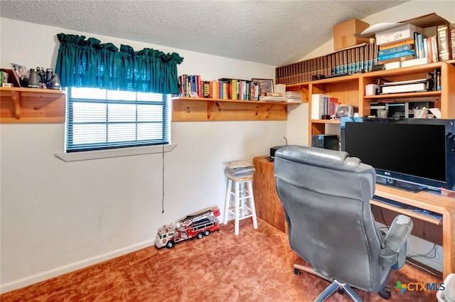 carpeted office space featuring a textured ceiling and lofted ceiling