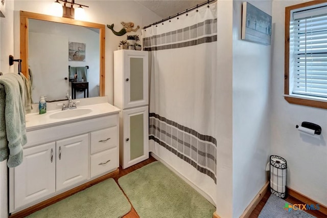 3662 N Fm 444, Inez, TX 77968 - bathroom featuring vanity, wood finished floors, and curtained shower