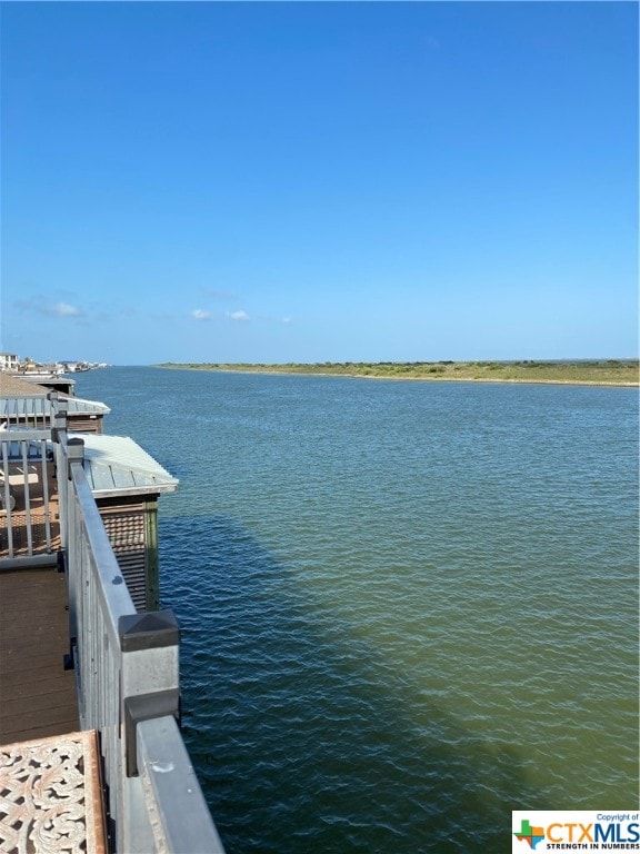 dock area featuring a water view