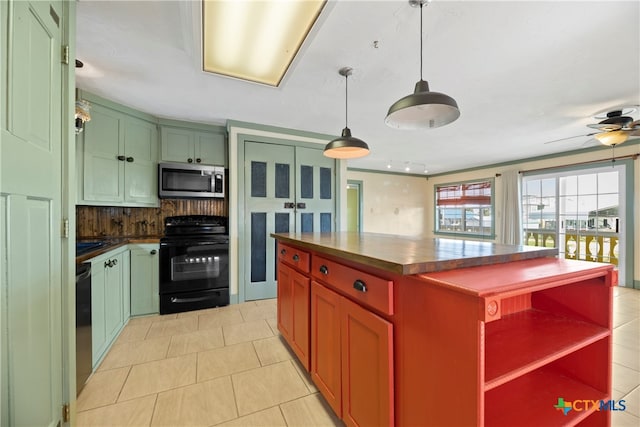 kitchen with a center island, black appliances, light tile patterned flooring, backsplash, and decorative light fixtures