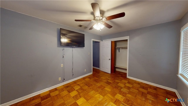 4610 Camellia St, Victoria, TX 77904 - unfurnished bedroom featuring a closet, a ceiling fan, and multiple windows