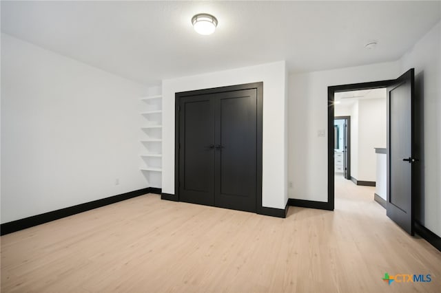 unfurnished bedroom featuring light hardwood / wood-style flooring