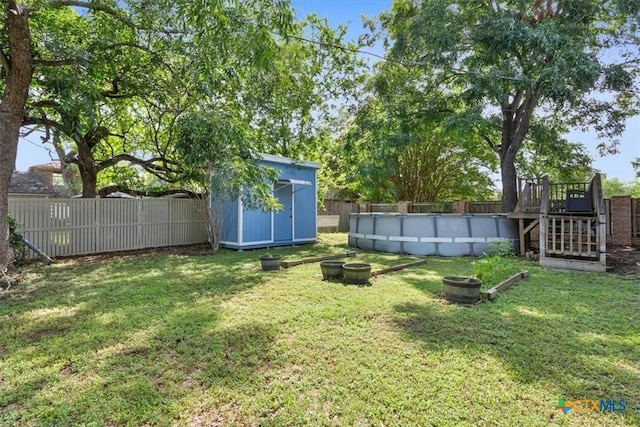 910 Mill Creek Dr, Salado, TX 76571 - fenced backyard with a storage shed and a wooden deck