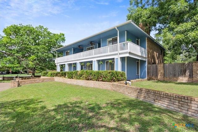 910 Mill Creek Dr, Salado, TX 76571 - rear view of house with ceiling fan and a balcony