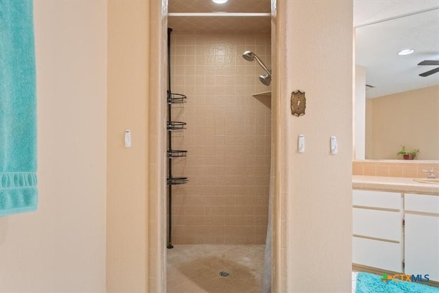 910 Mill Creek Dr, Salado, TX 76571 - bathroom featuring a shower stall, vanity, recessed lighting, and a ceiling fan