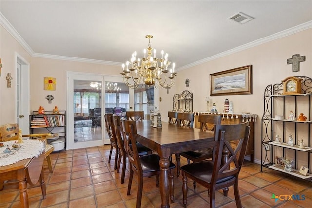 910 Mill Creek Dr, Salado, TX 76571 - tiled dining space featuring ornamental molding and a chandelier