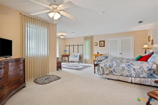 910 Mill Creek Dr, Salado, TX 76571 - bedroom with carpet floors and ceiling fan