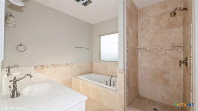 1974 Canyon Bnd, Canyon Lake, TX 78133 - full bath featuring a garden tub, double vanity, and a stall shower