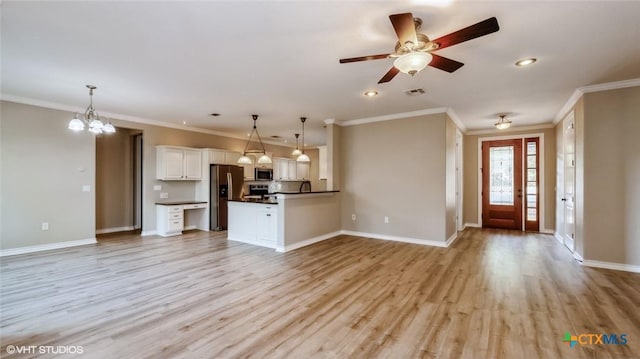 1974 Canyon Bnd, Canyon Lake, TX 78133 - unfurnished living room with light wood-style flooring, a chandelier, baseboards, crown molding, and recessed lighting