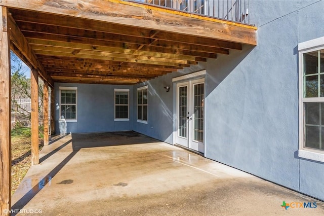 1974 Canyon Bnd, Canyon Lake, TX 78133 - view of patio / terrace featuring french doors and an attached carport