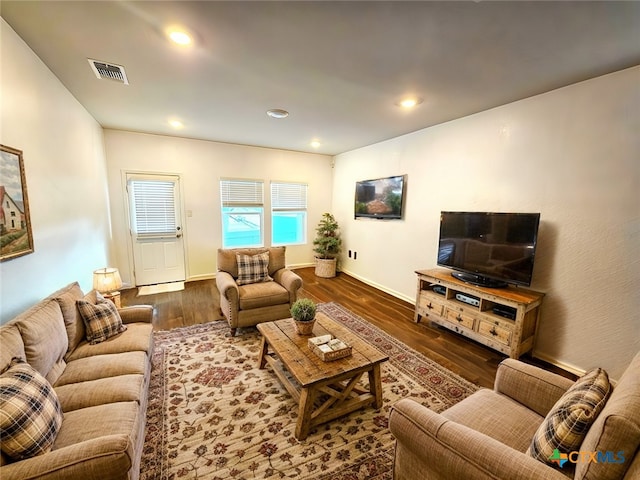 living room featuring dark hardwood / wood-style flooring