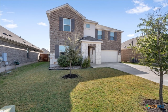 view of front property with a garage and a front yard