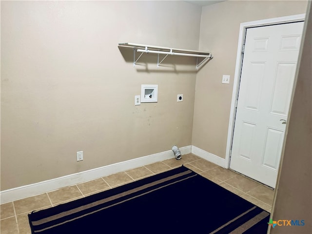 clothes washing area featuring hookup for a washing machine, electric dryer hookup, and light tile patterned flooring