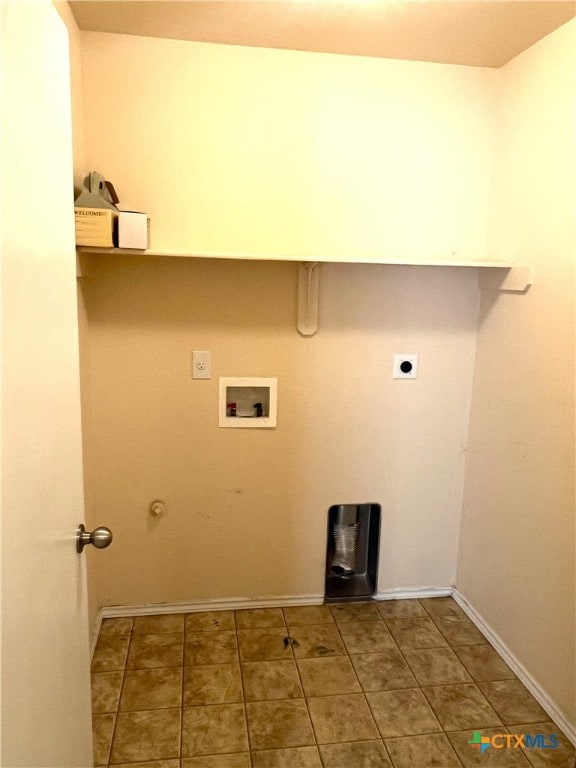 laundry room featuring washer hookup, electric dryer hookup, tile patterned floors, and hookup for a gas dryer