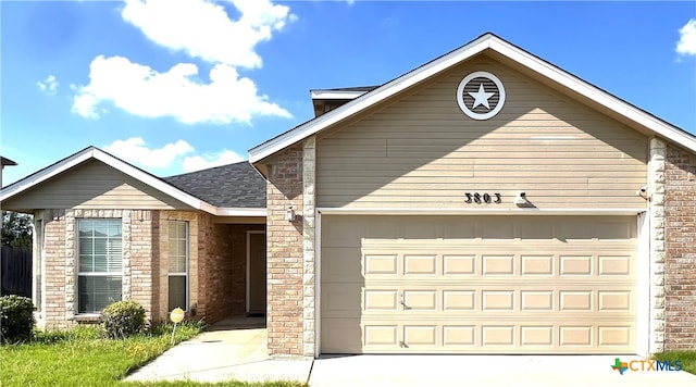 view of front of home with a garage