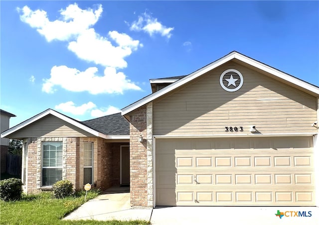 ranch-style home with a garage