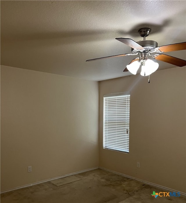 unfurnished room with a textured ceiling and ceiling fan