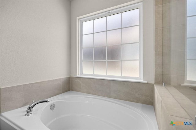 1821 Holleman Dr, Temple, TX 76502 - full bath featuring a garden tub and plenty of natural light