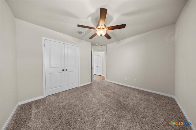 1821 Holleman Dr, Temple, TX 76502 - unfurnished bedroom featuring carpet, a closet, and ceiling fan
