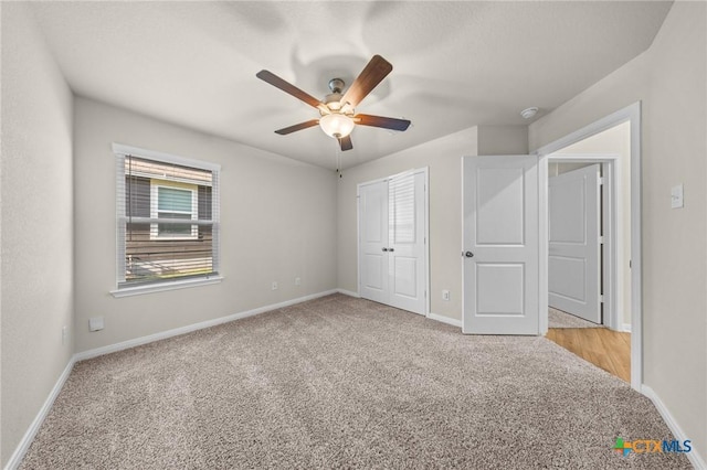 1821 Holleman Dr, Temple, TX 76502 - unfurnished bedroom featuring light carpet, a ceiling fan, and a closet