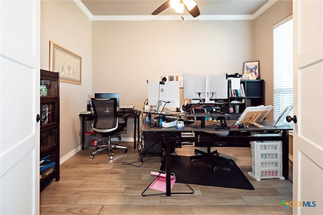 office space featuring ceiling fan, baseboards, wood finish floors, and ornamental molding