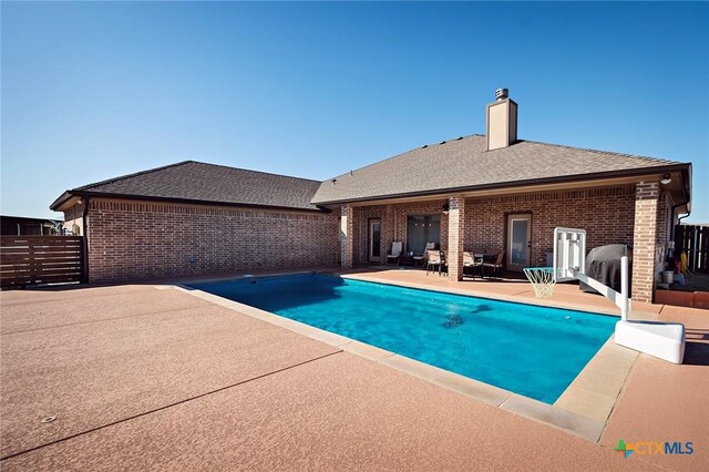 view of pool featuring a fenced in pool, a patio, and fence