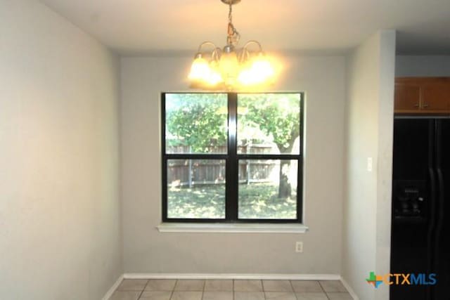1213 Marlee Cir, Copperas Cove, TX 76522 - unfurnished dining area featuring plenty of natural light, a chandelier, and baseboards