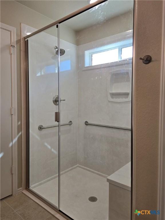 1421 Fossil Trl, Belton, TX 76513 - bathroom featuring a stall shower and tile patterned flooring