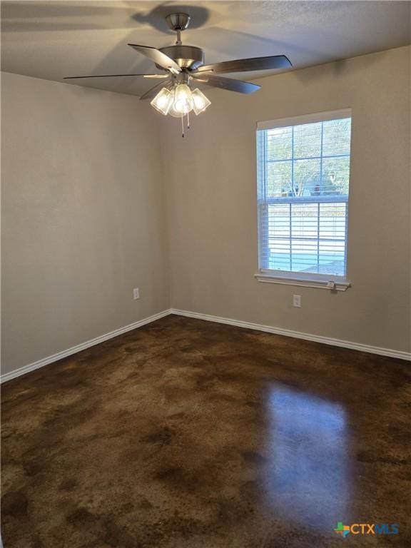1421 Fossil Trl, Belton, TX 76513 - spare room with ceiling fan and baseboards
