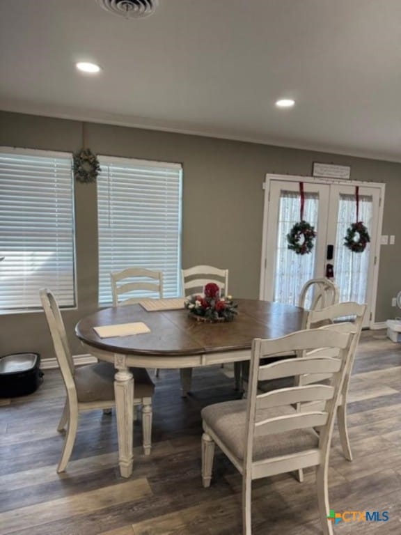 dining area featuring recessed lighting, french doors, baseboards, and wood finished floors