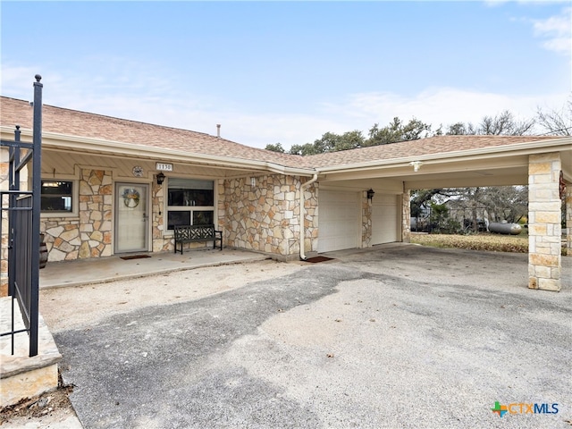 ranch-style home with a garage