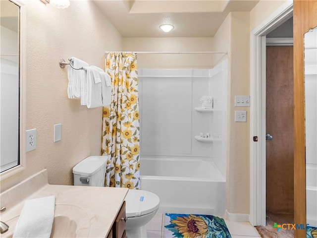 full bathroom featuring vanity, toilet, tile patterned flooring, and shower / bath combo