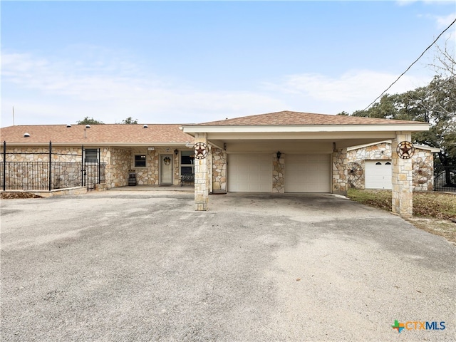 ranch-style home with a garage