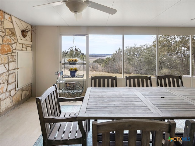 interior space featuring ceiling fan